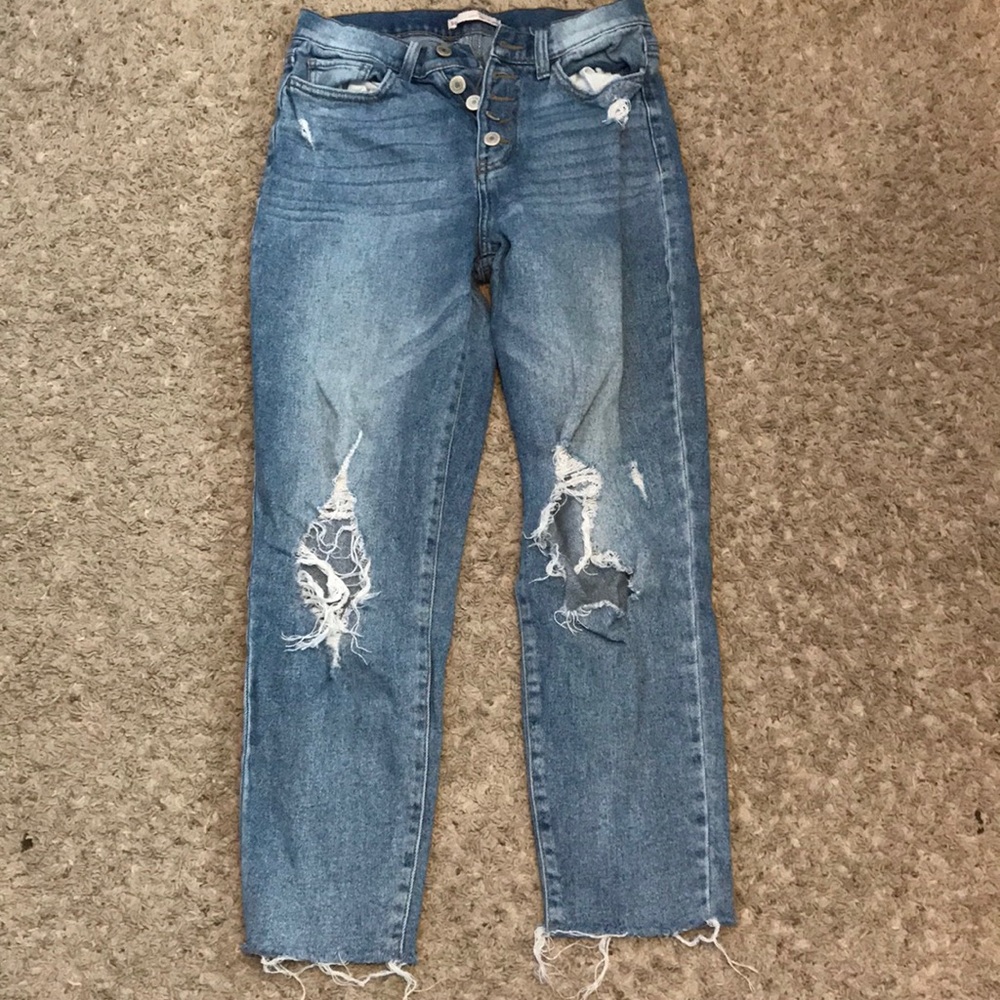 High waisted ripped blue jeans